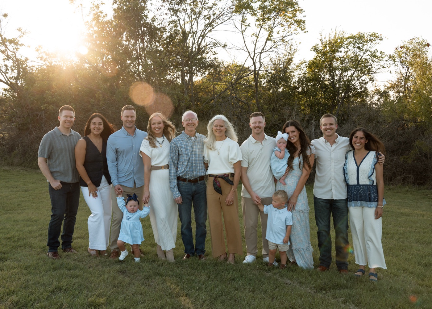 The family behind Booster Banner Store, outside the shop on Camp Bowie Boulevard in Fort Worth